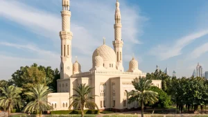 Image Alt Text: "Exterior view of Jumeirah Mosque, an architectural marvel with intricate designs and stunning domes, showcasing its beauty and grandeur in Dubai."