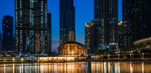 "Illustration showcasing Dubai Opera's stunning architecture and a captivating performance on stage, inviting you to experience world-class entertainment in Dubai.